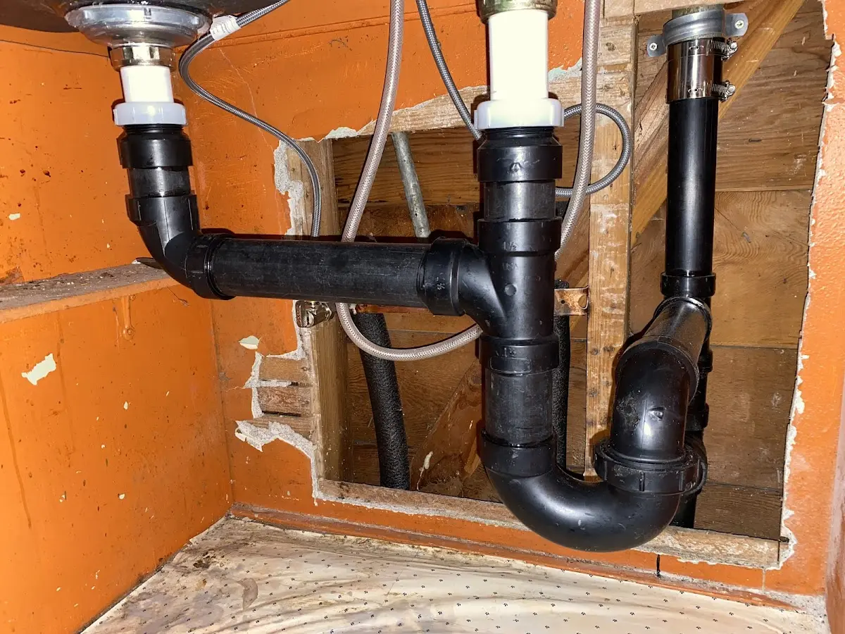 Professional Garbage Disposal Repair equipment and tools on the job in Barton Creek